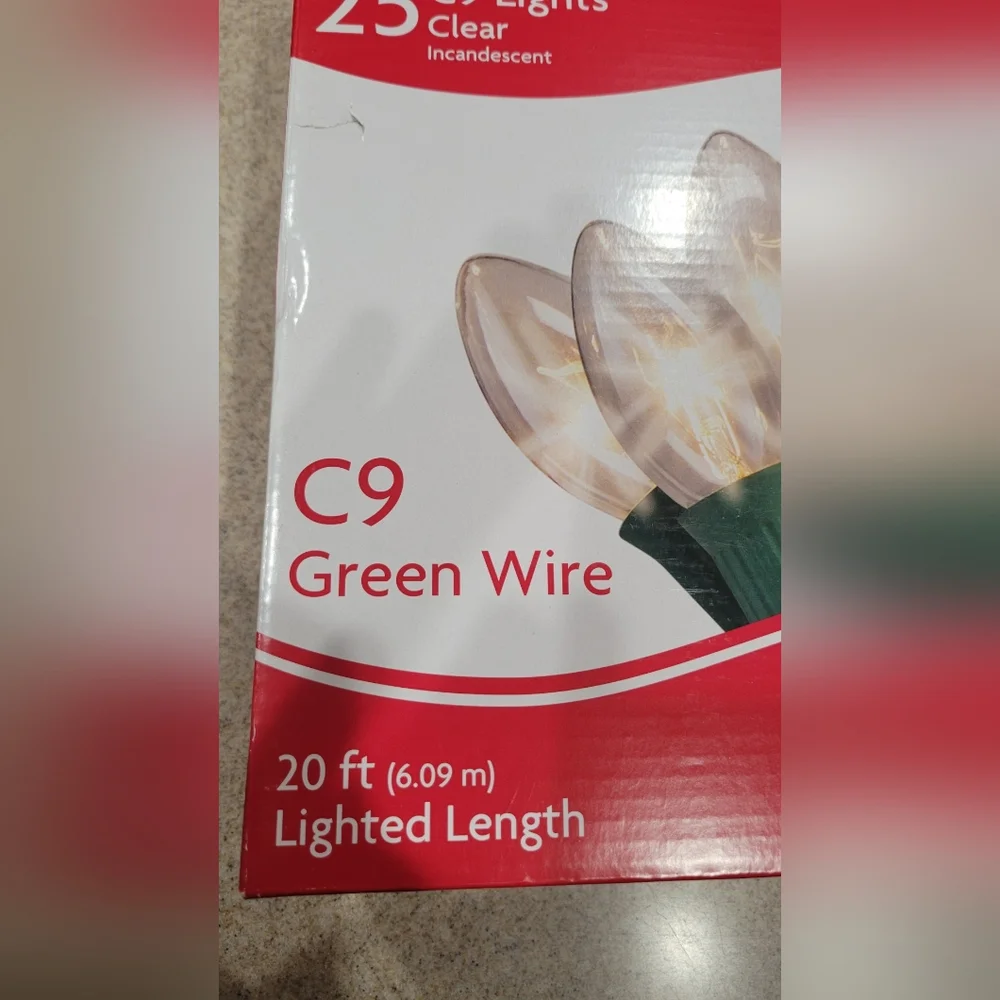 New Holiday Home 25 bulb ct c9 clear bulbs green string lights. 21' total length